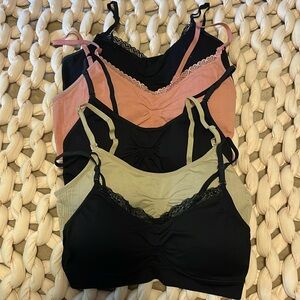 Lot of 5 Coobie one-size wireless pullover bras. 3 black, 1 pink, 1 beige
